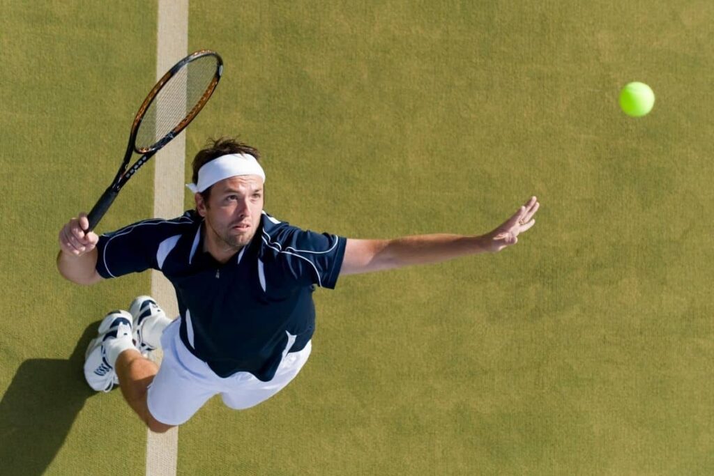 Bird’s eye view of a tennis serve in action.