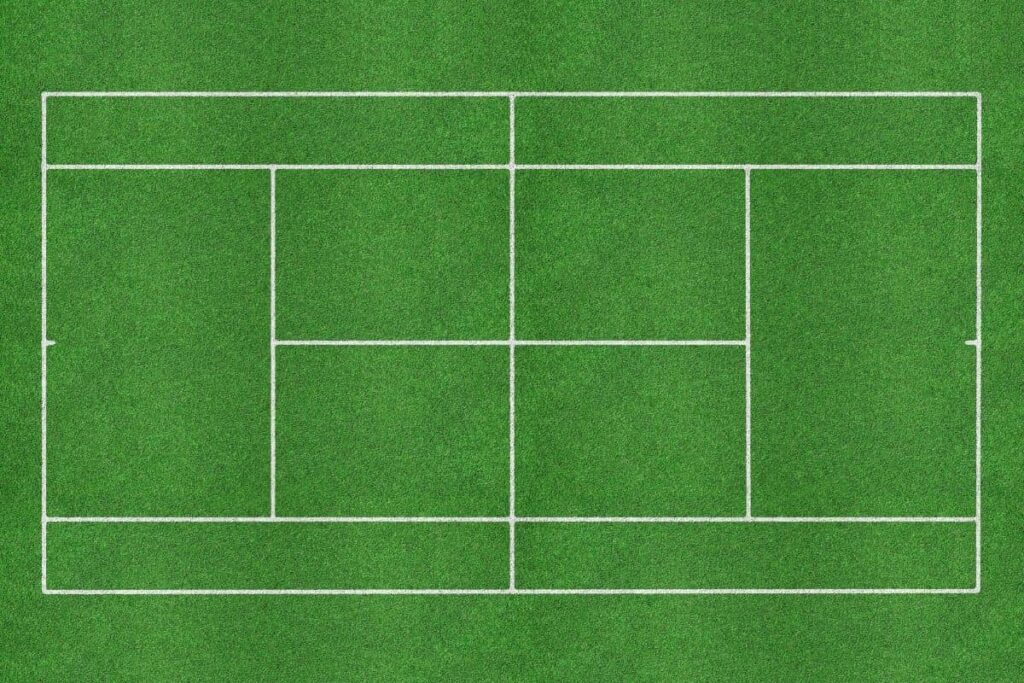 Bird's eye view of a grass tennis court.